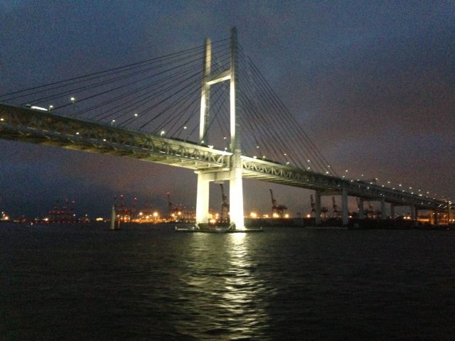 a night shot of the Yokohama bay bridge